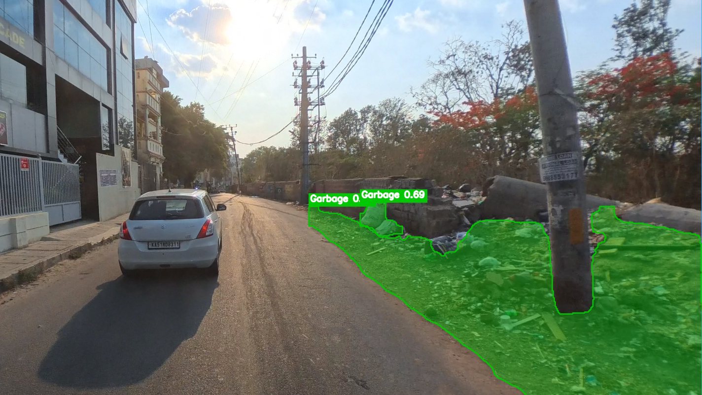 A frame from the device's video, with a garbage pile along the roadside